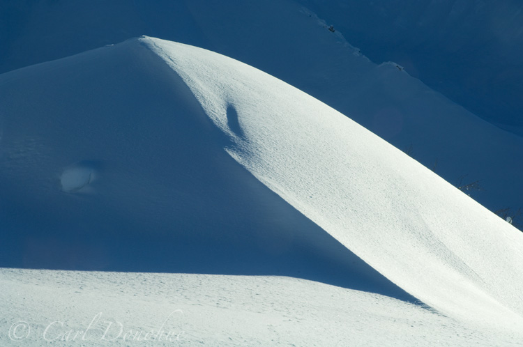 A backlit snow covered ridge, winter, Wrangell mountains, Wrangell - St. Elias National Park, Alaska.
