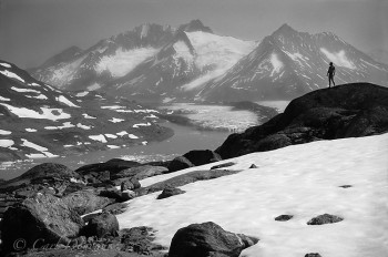 Hiker silhouetted against the Chugach mountains.