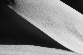 Abstract pattern from a snow covered ridgeline, wintertime, Wrangell St. Elias National Park, Alaska.