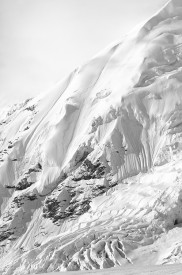 Mt Jarvis and its glaciated face, covered under a fresh snowfall, in black and white photo. Wrangell Mountains, Wrangell-St. Elias National Park and Preserve, Alaska.